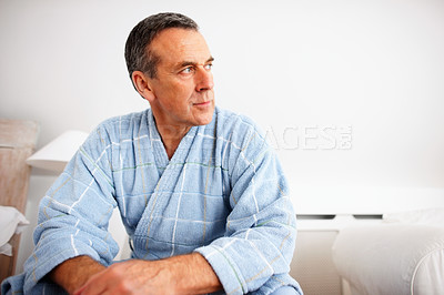 Buy stock photo Thinking, elderly man and relax in bedroom for rest, nostalgia and thoughtful at home. Remember, senior person and past memories in morning for retirement plan, reflection and mindfulness in Canada