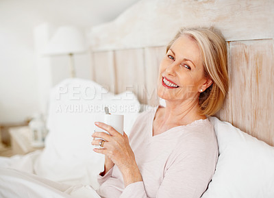 Buy stock photo Senior woman, portrait and drinking tea in bedroom for relax or comfort on weekend with break, rest and reflection. Elderly, female person and remember in happiness, morning routine or memory in home