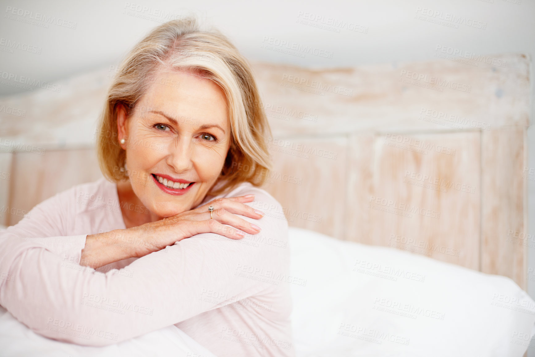 Buy stock photo Closeup portrait of a happy mature woman giving you a cute smile