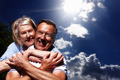 Buy stock photo Portrait, hug and old couple with blue sky, love and marriage with happiness, romance and trust. Face, outdoor and man with woman, relationship and time together with break, care and embrace in park