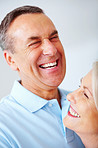 Cheerful senior man and woman together having fun