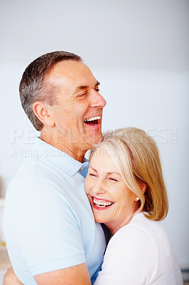 Buy stock photo Couple, laugh and hug with smile for joke, love and romance for embrace with mature man. Support, retirement and funny and happiness for married people, care and home for relax and humor together