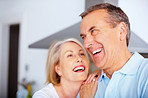 Cheerful senior man with wife spending time together