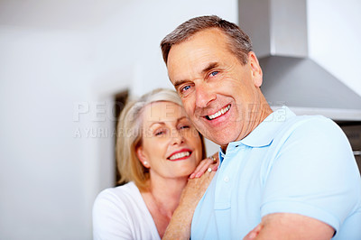 Buy stock photo Senior, couple and man with portrait in kitchen for bonding, embrace and happy with retirement in home. Elderly, people and face with hugging, relax and support in marriage with romance in house