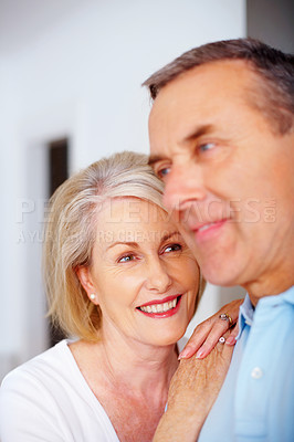 Buy stock photo Mature couple, woman and together for care and support, romance or closeup in home. Marriage, face or relax for bonding in retirement for man or female person in England,  smile and loyalty in house