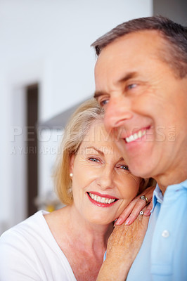 Buy stock photo Mature couple, woman and together for care and support, romance or closeup in home. Marriage, face or relax for bonding in retirement for man or female person in England,  smile and portrait in house