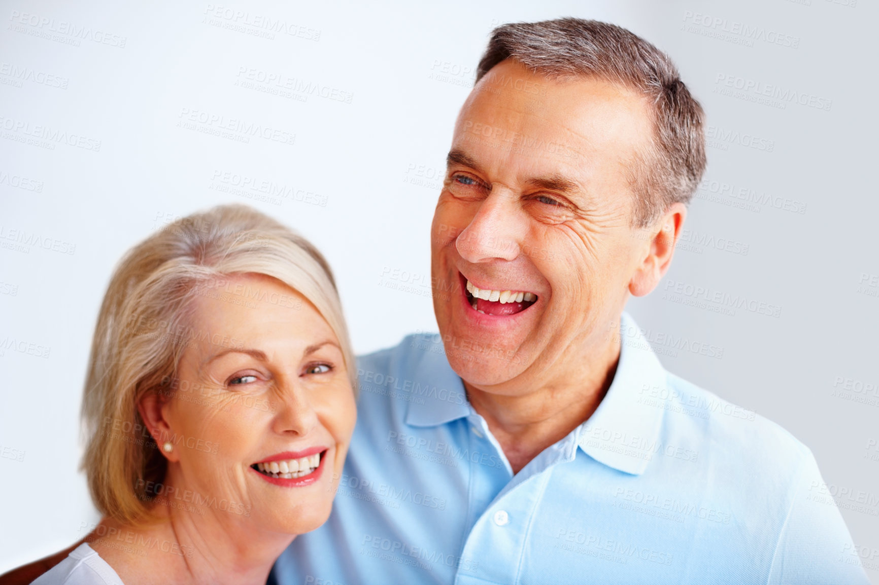 Buy stock photo Couple, laugh and face with smile for joke, love and romance for closeup of mature man. Support, retirement and funny and happiness for married people, retired and home for relax and humor together