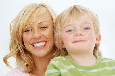 Buy stock photo Portrait, face and mom smile with child for love, care and bonding together in studio isolated on white background. Mothers day, young boy kid and happy for childhood support, freedom and development