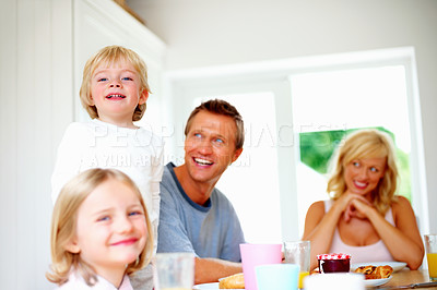 Buy stock photo Happy family, portrait and breakfast at table in home with children and parents together in morning. Healthy, food and brunch with kids, mom and dad with nutrition or diet for energy and wellness