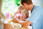 Family having their breakfast together