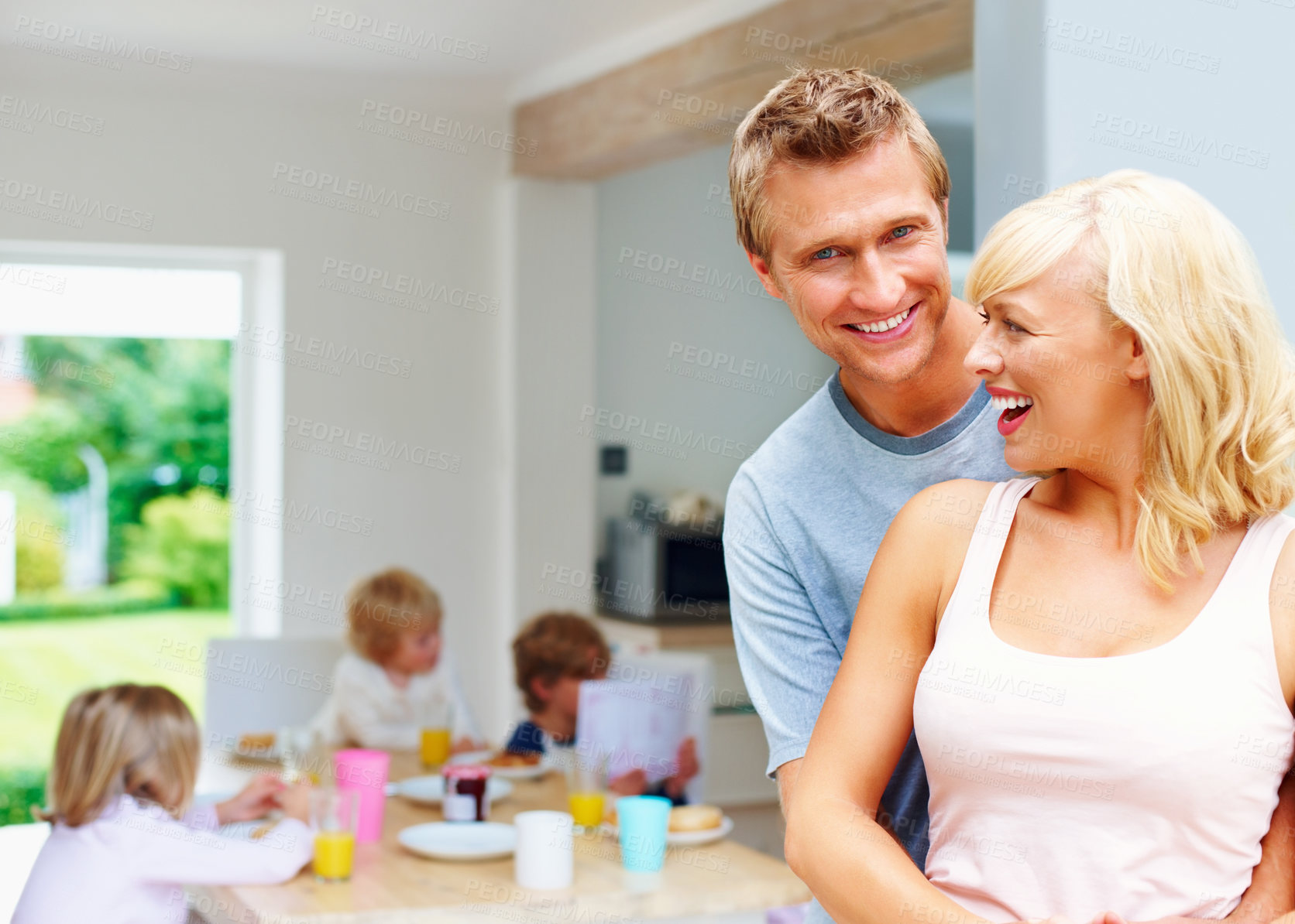 Buy stock photo Breakfast, mother and father in hug at table in home with children eating together in morning. Healthy, food and portrait at brunch with kids, mom and dad or nutrition in diet for energy and wellness