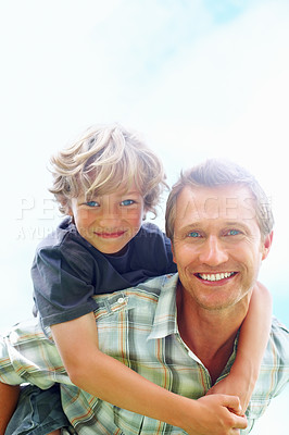 Buy stock photo Father, son and portrait outdoor with piggyback for bonding, relationship and freedom with blue sky or happy. Family, man and boy child with playing, care and love for excitement, peace and support