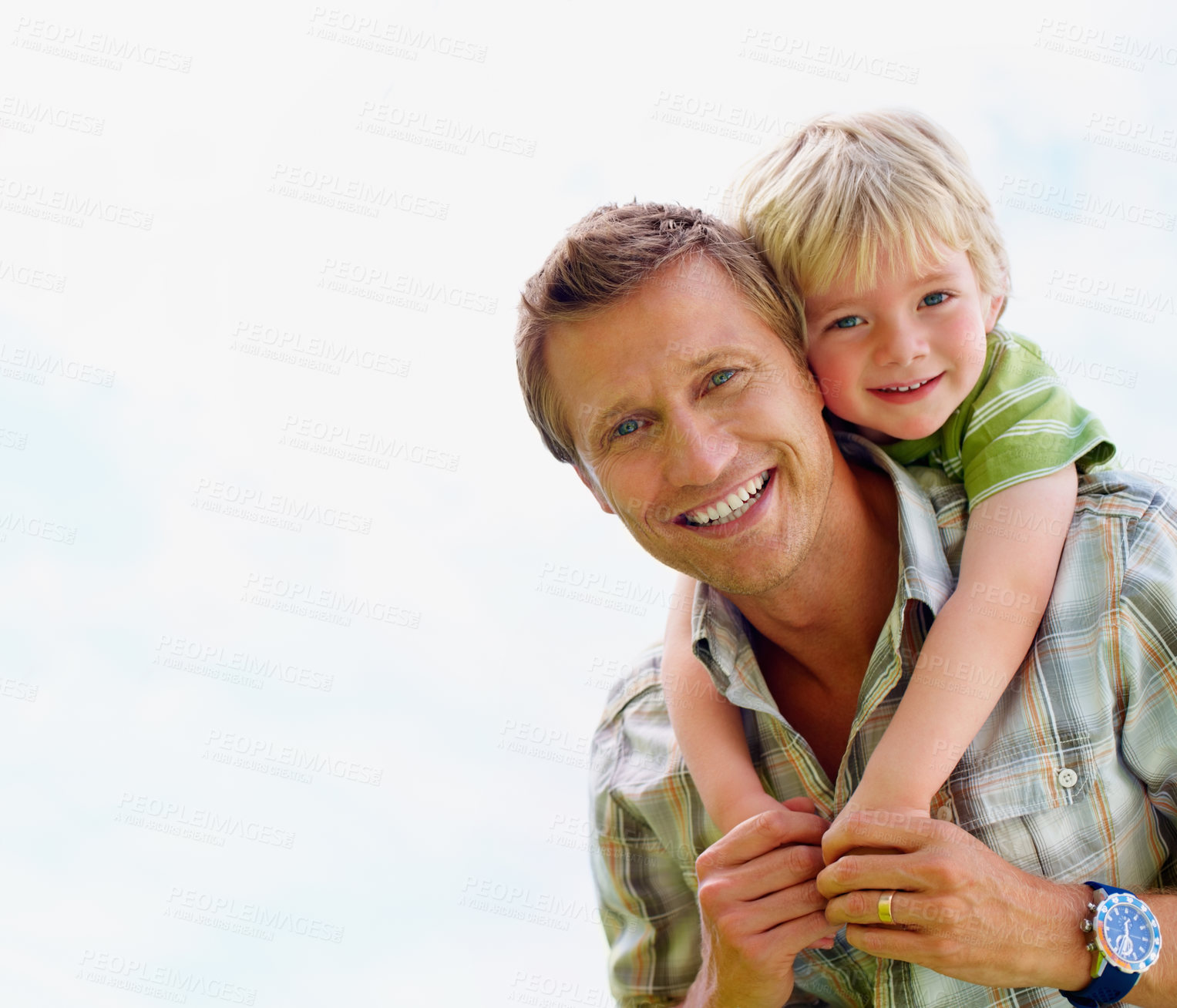 Buy stock photo Father, son and portrait or happy with piggyback for bonding, relationship and freedom with mock up in nature. Family, man and boy child with playing, care and love for excitement, peace and support