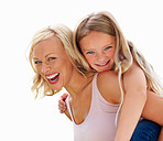 Mother giving piggyback to her daughter