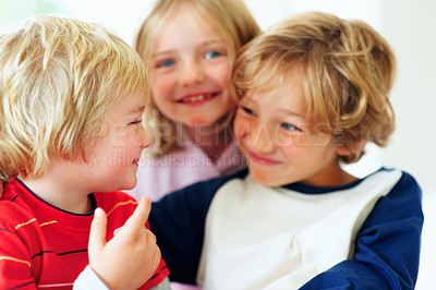 Buy stock photo Family, kids and funny face in the bedroom with brother siblings playing together in their home. Love, smile or having fun with boy and girl children on a bed in their apartment for weekend bonding