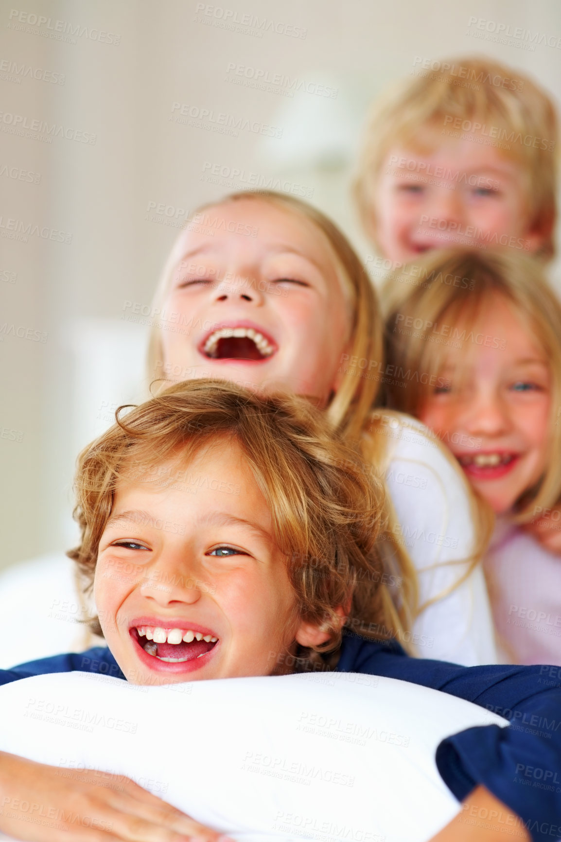 Buy stock photo Portrait, love or funny with brother and sister sibling children on a bed in their home together. Family, happy or laughing with young boy and girl kids in the bedroom of an apartment on the weekend