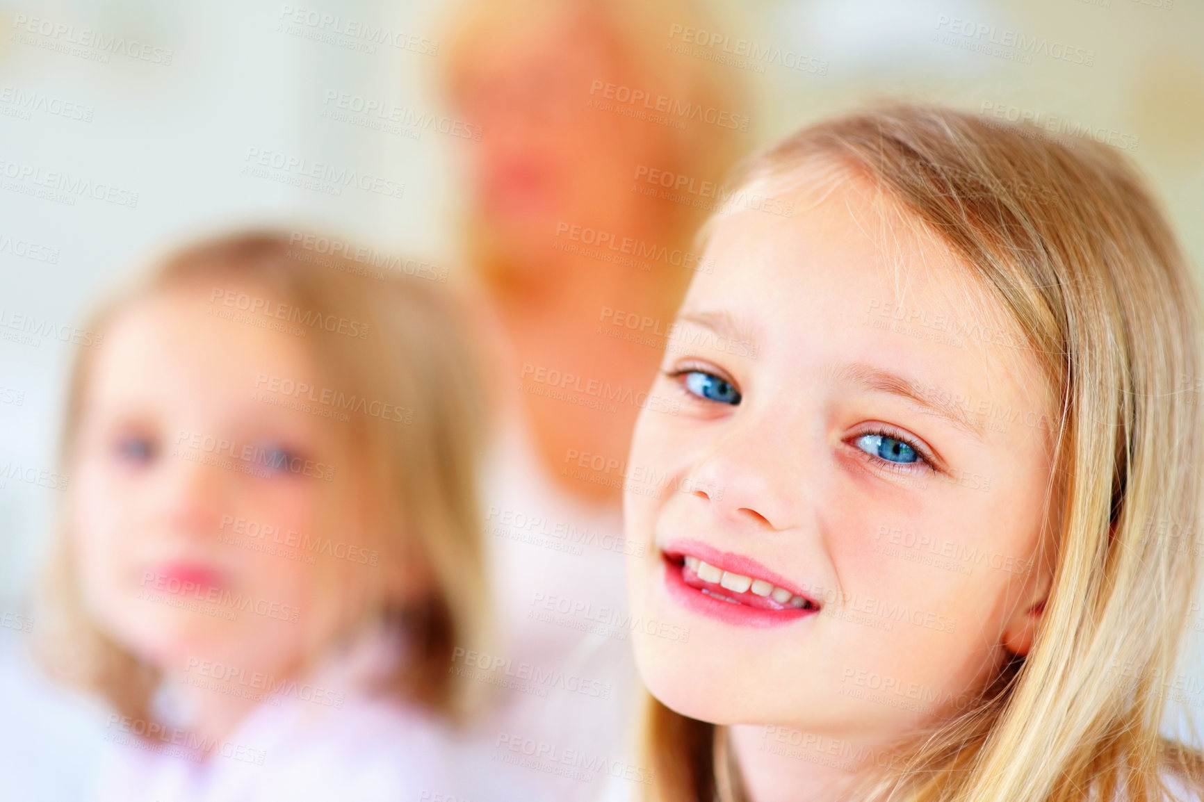 Buy stock photo Happy, smile and portrait of sibling girls in home for bonding, love and cute relationship. Family, childhood sisters and face of young kids for playing, fun and relaxing in living room together