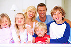 Happy family - Smiling middle aged couple with their children