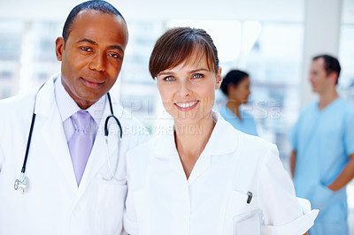 Buy stock photo Portrait, teamwork and doctor with wellness, nurse and career with leadership, clinic and medicare. Face, people and group with medical, professional and uniform in a hospital, smile and healthcare