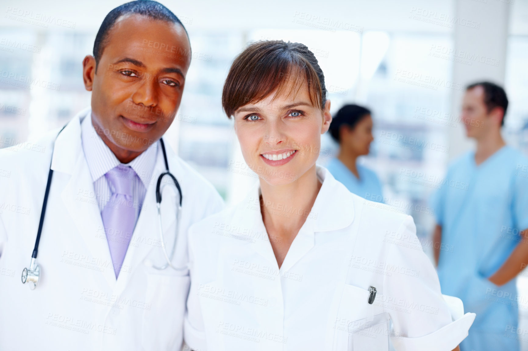 Buy stock photo Portrait, teamwork and doctor with wellness, nurse and career with leadership, clinic and medicare. Face, people and group with medical, professional and uniform in a hospital, smile and healthcare