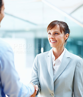 Buy stock photo Business woman, handshake and meeting for partnership, professional introduction and hello in a law firm. Corporate lawyer, people or clients shaking hands for legal success, thank you and consulting