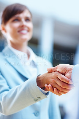 Buy stock photo Happy business people, handshake and meeting for b2b, partnership or corporate deal at office. Businessman and woman shaking hands in greeting, introduction or company agreement together at workplace