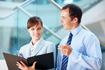 Buy stock photo Business people, documents and teamwork with folder, planning budget and financial report in lobby. Corporate manager, woman or employees reading paperwork, bookkeeping or revenue proposal for advice