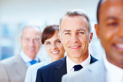 Buy stock photo Businessman, portrait and leader for team, line and ceo or director for business in office. Colleagues, happy and smile for management and male person for pride, diversity and corporate entrepreneur 