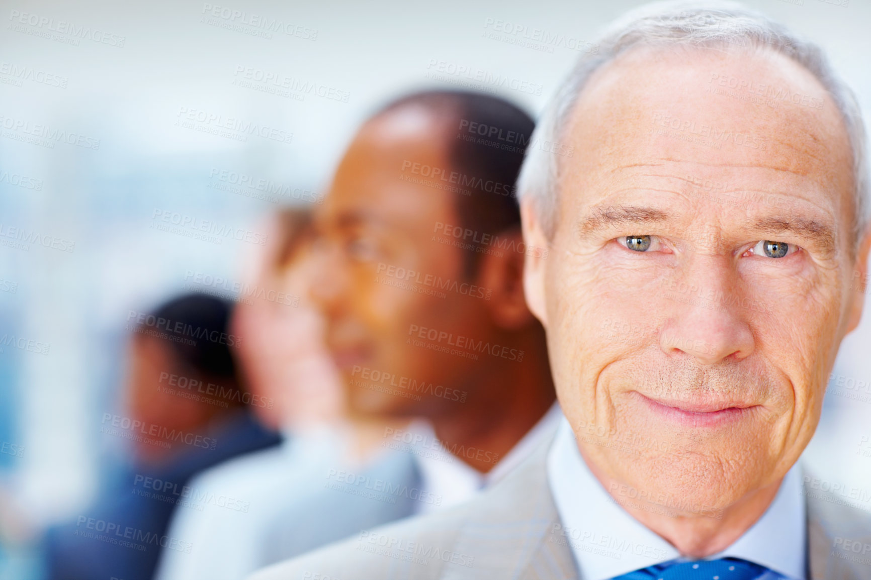 Buy stock photo Closeup of senior Business man with team behind him