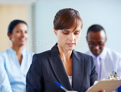 Buy stock photo Business woman, writing and clipboard in meeting, presentation or corporate workshop at office. Female person or employee taking notes in staff training, team conference or seminar at workplace