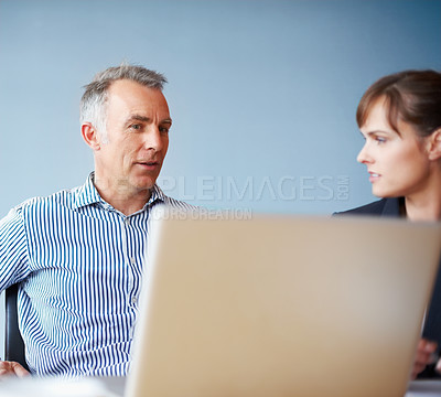 Buy stock photo Brainstorming, teamwork and business people with a laptop, meeting and discussion with planning, project and internet. Cooperation, staff and woman with man, computer and research with conversation