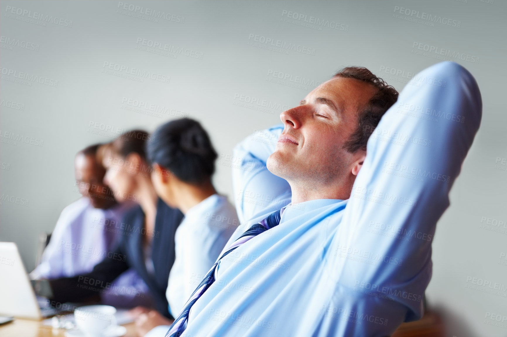 Buy stock photo Hands, head and business man relax in office or chair to finish work, project and productivity. Corporate worker, team and happy person resting, smile and calm in meeting for break, peace and tired