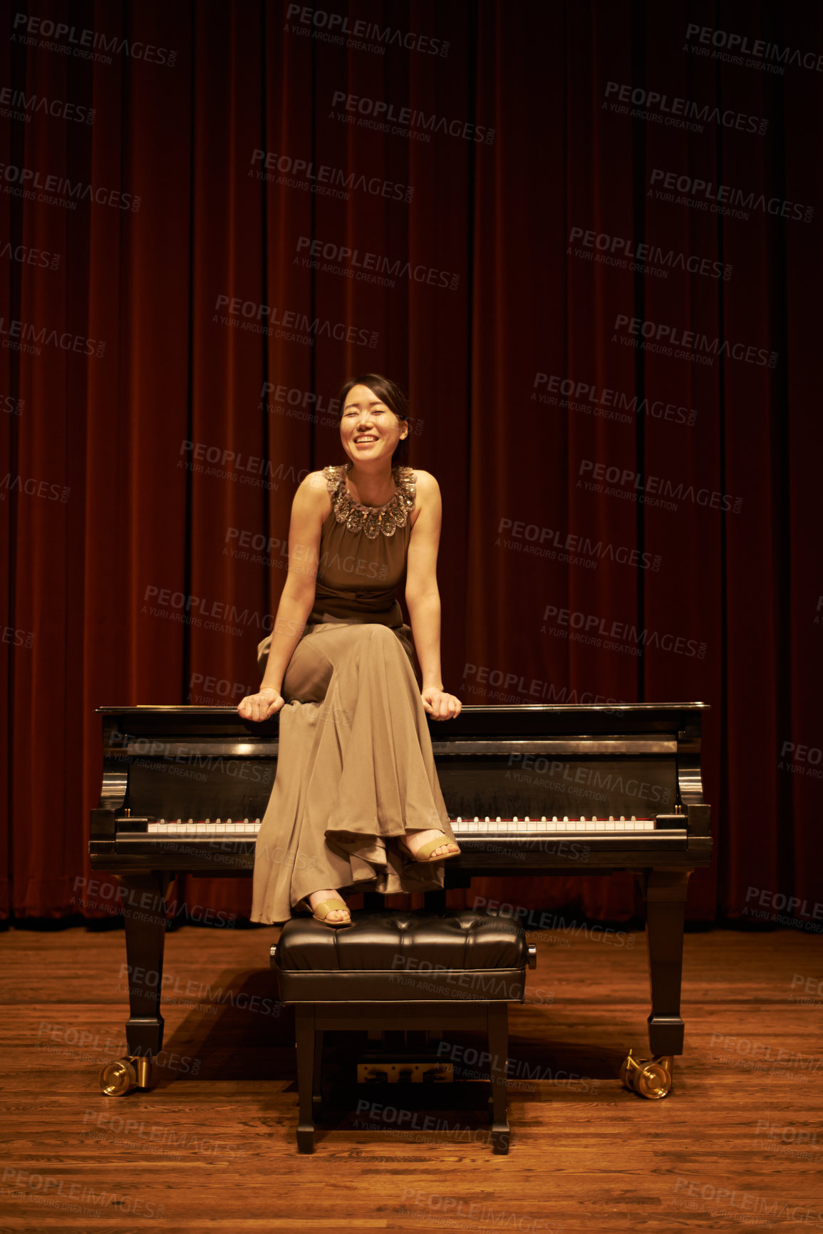 Buy stock photo Piano, theatre and happy Asian woman musician with concert music ready for art performance with confidence. Sitting, curtain and musical with stage solo in with pianist, instrument and opera dress