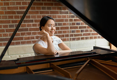 Buy stock photo Asian woman, musician and thinking with piano for career, art or music with instrument. Female person, musical pianist or acoustic player in wonder, thought or ambition for sound, talent or skill