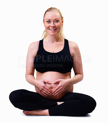 Buy stock photo Love and new life - pregnant woman with hands forming heart shape against white background