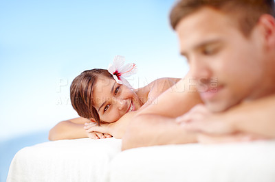 Buy stock photo Pretty young woman lying at a spa with her partner