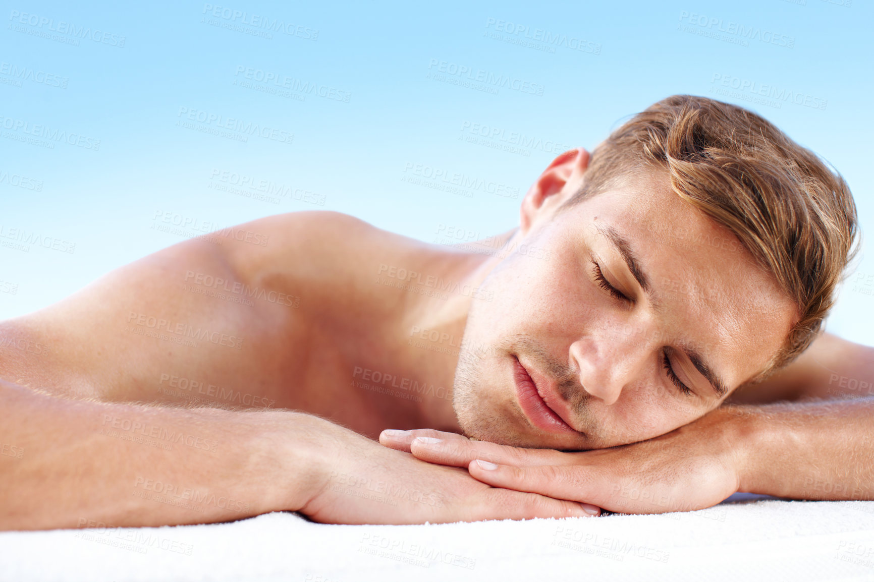 Buy stock photo Massage, portrait and man in spa, sleeping and ready for luxury to relax in hotel, vacation and wellness. Holiday, guy and rest in paradise, treatment and stress free with nap and person in Hungary