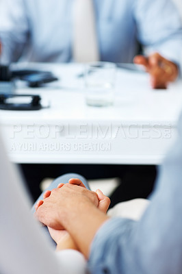 Buy stock photo Closeup of couple holding hands in office with advisor