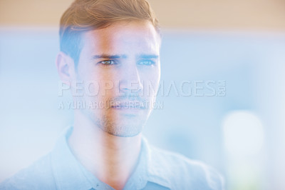 Buy stock photo Closeup of handsome young man looking out through glass