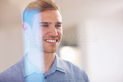 Buy stock photo Closeup of handsome young man smiling while looking out through glass