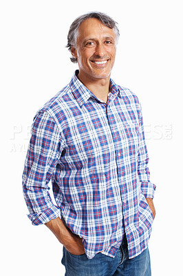 Buy stock photo Portrait of casually dressed mature business man smiling over white background with hands in pockets