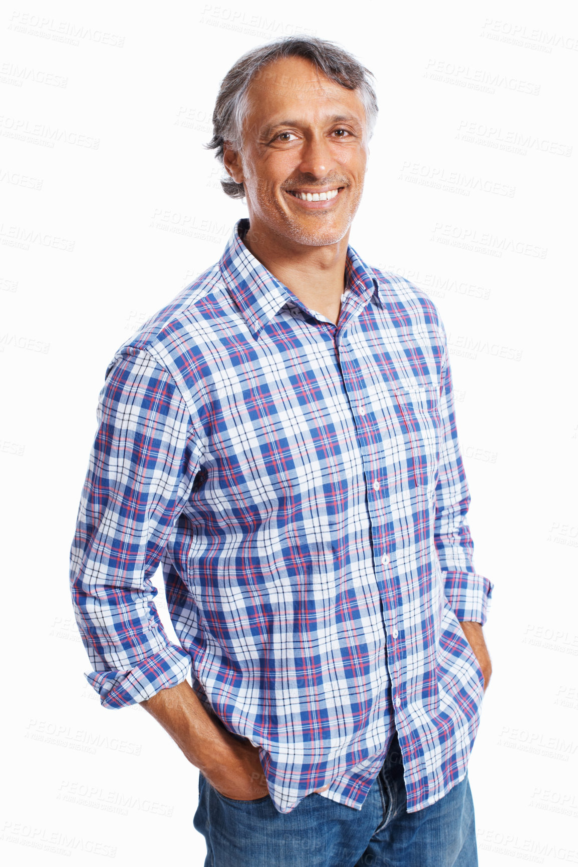 Buy stock photo Portrait of casually dressed mature business man smiling over white background with hands in pockets