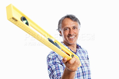 Buy stock photo Portrait of smiling mature architect holding spirit-level over white background