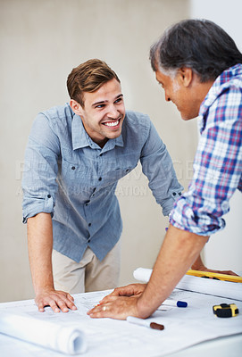 Buy stock photo Happy Caucasian man smiling while discussing with architect