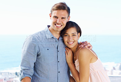 Buy stock photo Happy, couple and vacation portrait with hug, love and marriage on holiday for honeymoon outdoor. Smile, care and support of people with bonding on travel and trip in Greece with embrace by sea