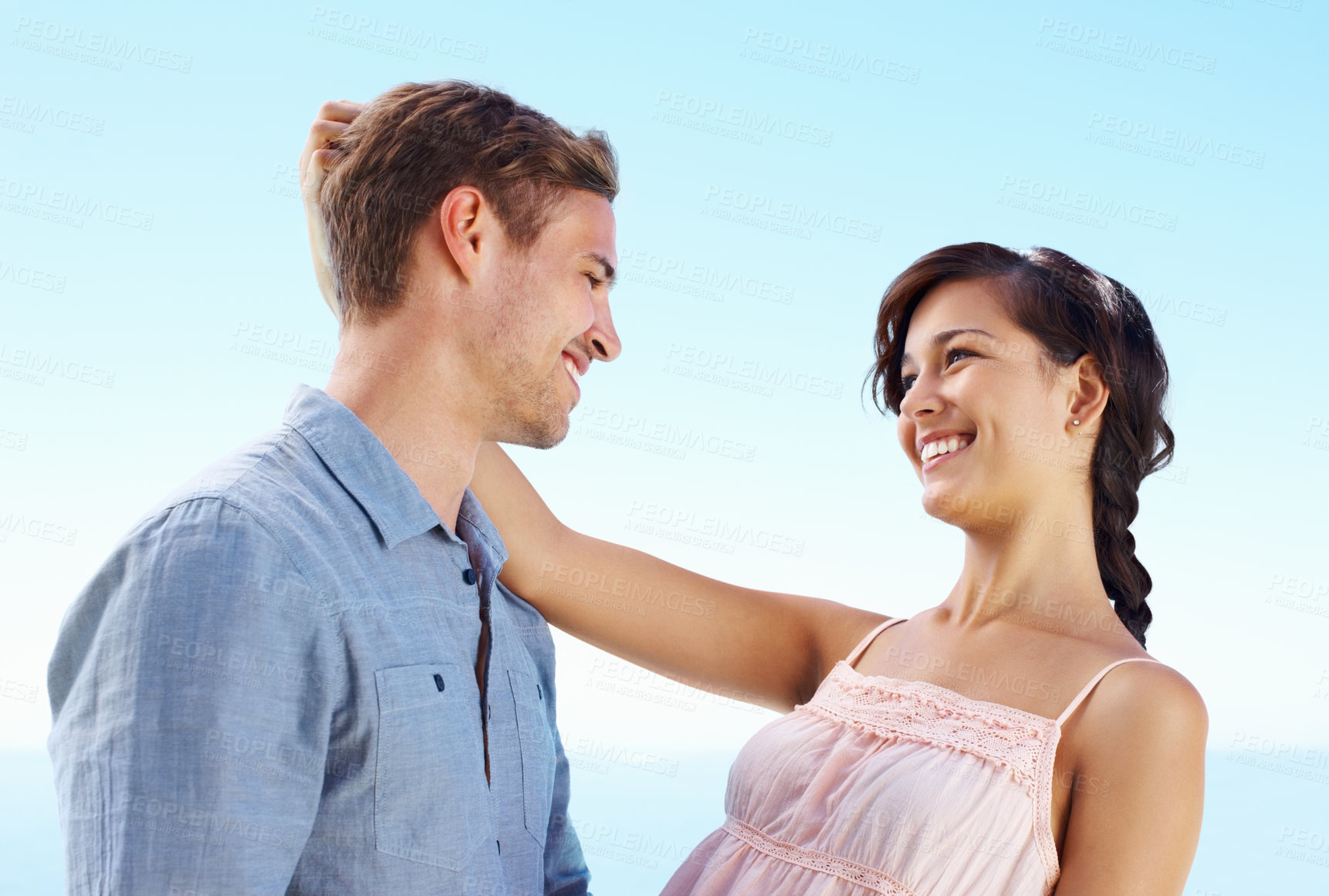 Buy stock photo Outdoor, couple and happy with hug for bonding with love, trust and support in Spain. People, relationship and smile for care on holiday or vacation for honeymoon to relax, break and fun for peace