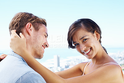 Buy stock photo Rooftop, couple and smile with hug for bonding with love, trust and support in Spain. People, relationship and happy in outdoor for care on holiday or vacation for honeymoon, relax and break for fun