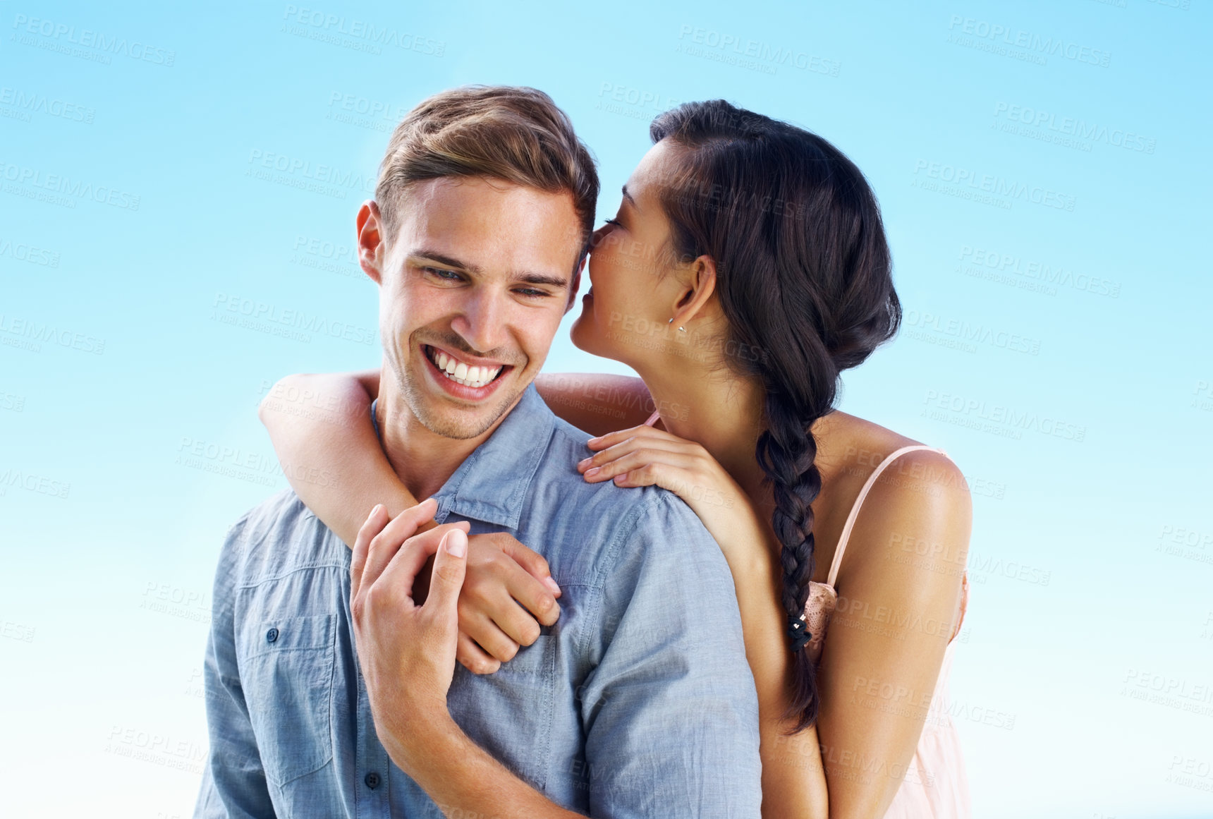 Buy stock photo Smile, couple and hug with love by blue sky for marriage commitment, romance and holiday of date outdoor. Happy, woman and man with embrace for engagement proposal, vacation trip and trust together