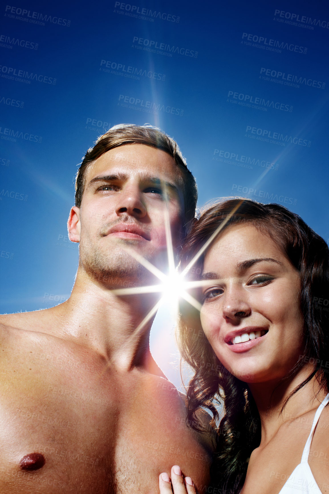 Buy stock photo Sky, portrait and smile of couple, bikini and confident in vacation, love and shirtless in summer. People, hug and together for date, woman and man in relationship for romance, holiday and relax