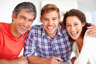 Buy stock photo Portrait of happy colleagues sitting together and smiling